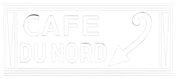 Black rectangular sign with white bold text reading 'CAFE DU NORD' and a white arrow pointing down and to the right.